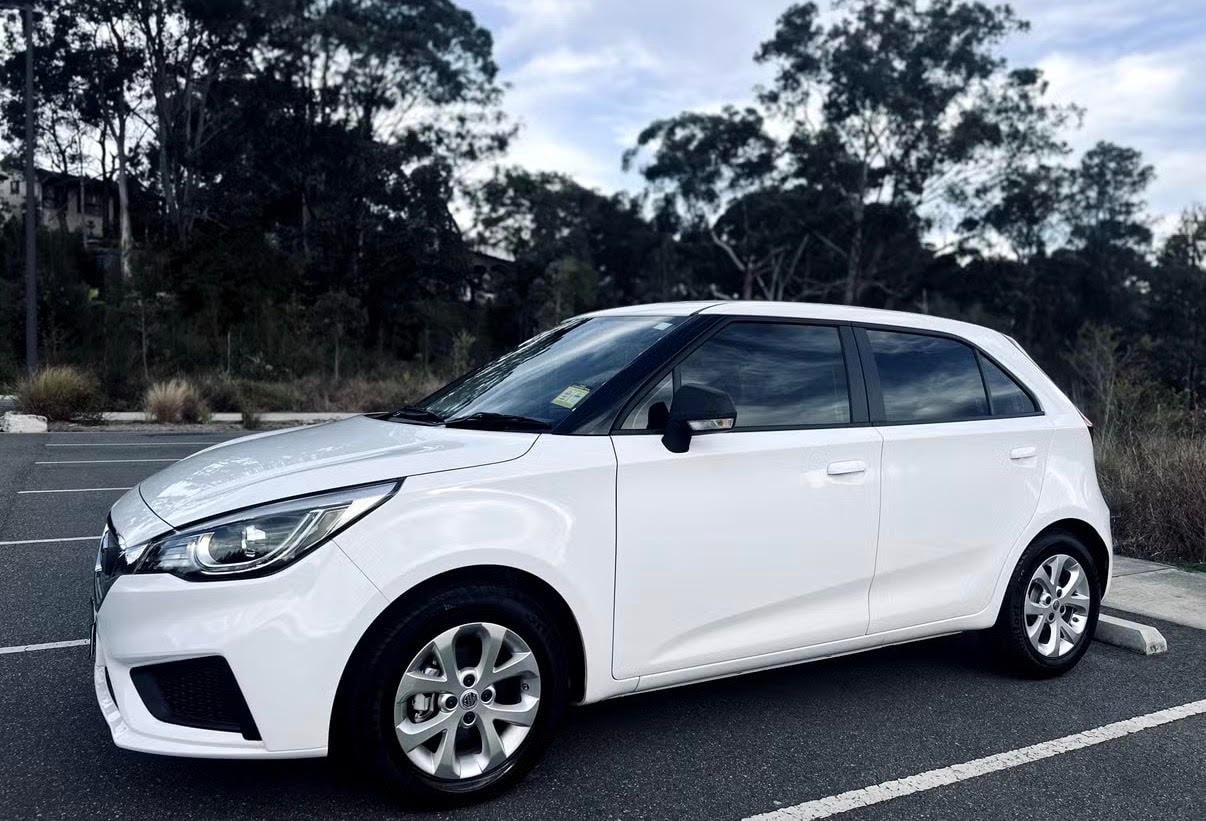 MG3 hatchback parked in parking lot — Luxroo rental fleet